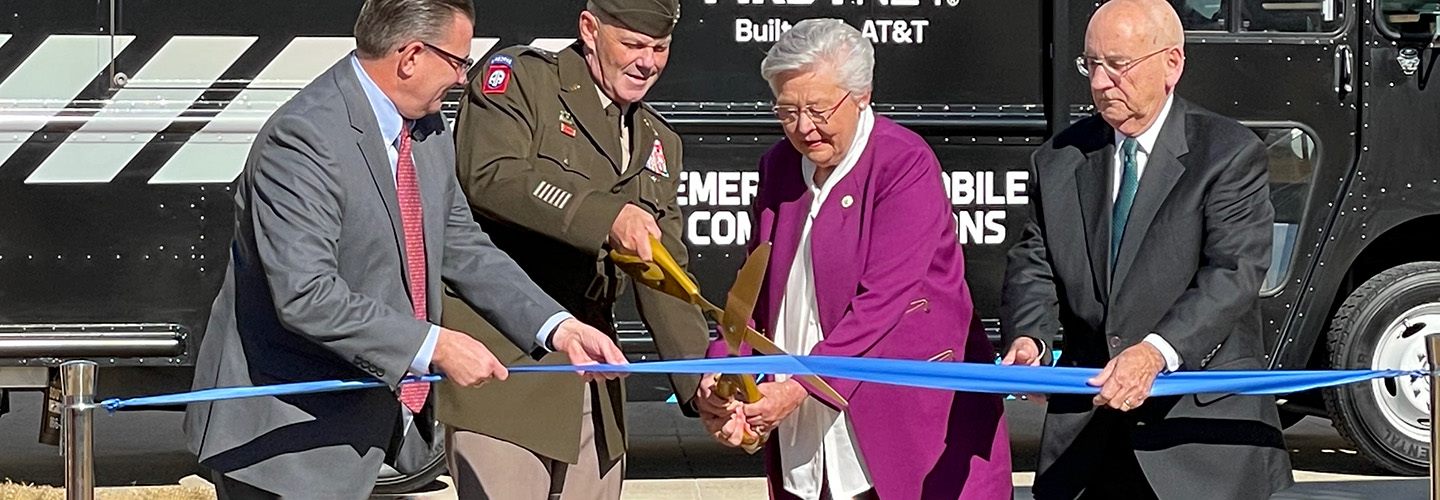 Leaders cut a ribbon at the Redstone Arsenal 