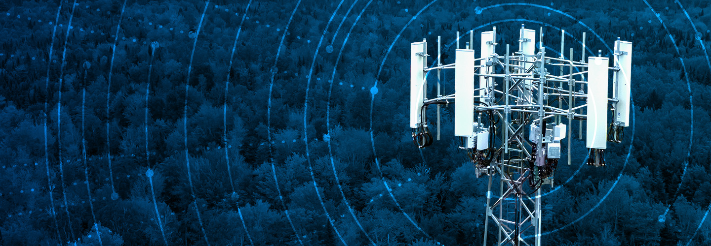 A FirstNet cell tower from which emerges a graphic representing radiating network signal