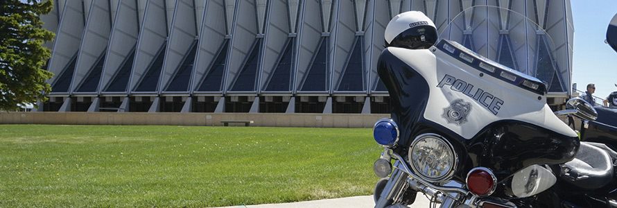 Police motorcycle outside a building