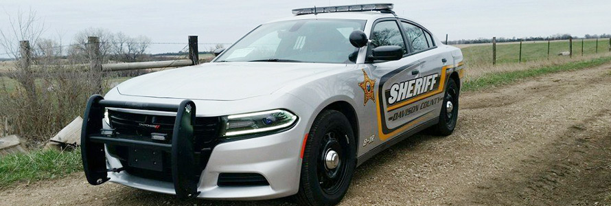 Police cruiser on a rural road