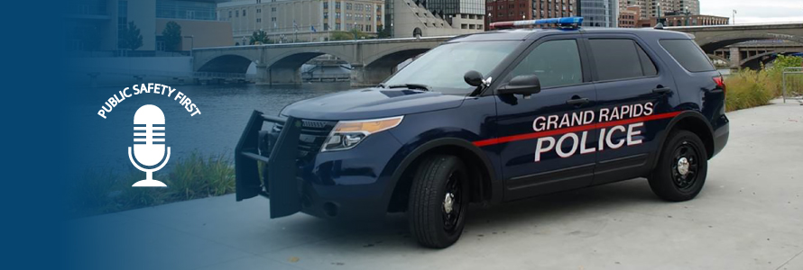 Grand Rapids police vehicle and Grand Rapids skyline