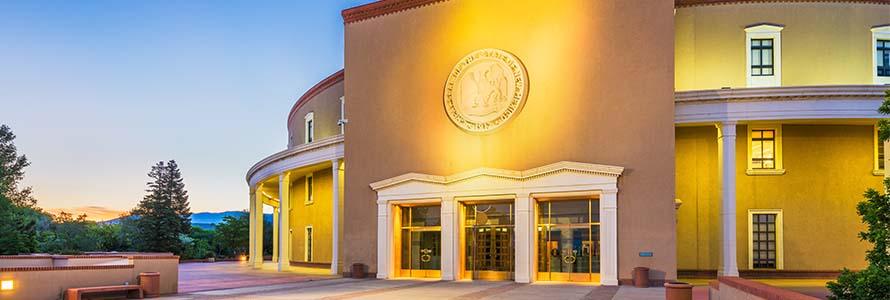 New Mexico state capitol building at dusk