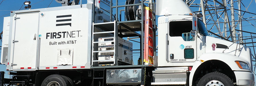 AT&T FirstNet  Satellite Cell Light Truck and cell tower in background 