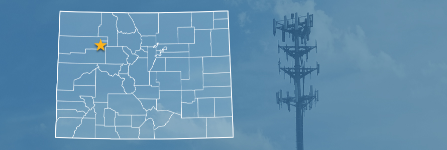 The state of Colorado, with outlined county borders and a star locating Glenwood Canyon; a cell tower 