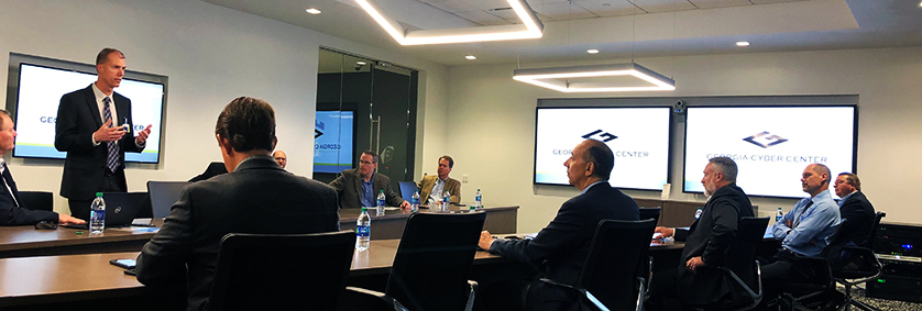 FirstNet Board members sit and listen to a presentation during a visit the Georgia Cyber Center