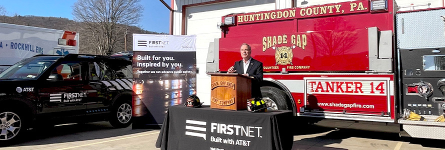 John Joyce talking outside in front of a fire truck during a press event in Huntingdon County, PA.