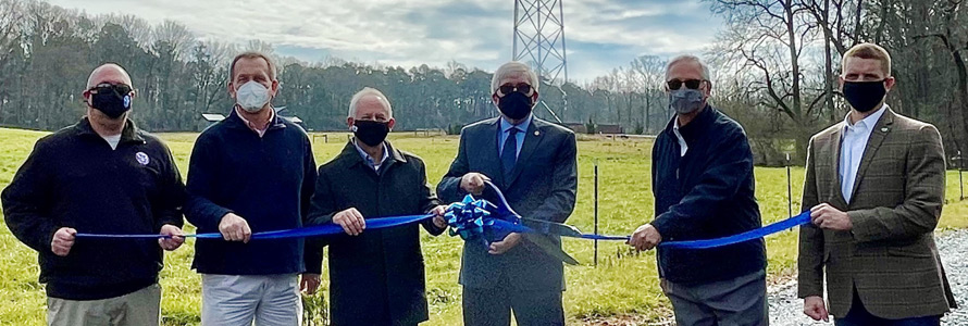 Community representatives cut a ribbon near new FirstNet cell site near Moore County, North Carolina.