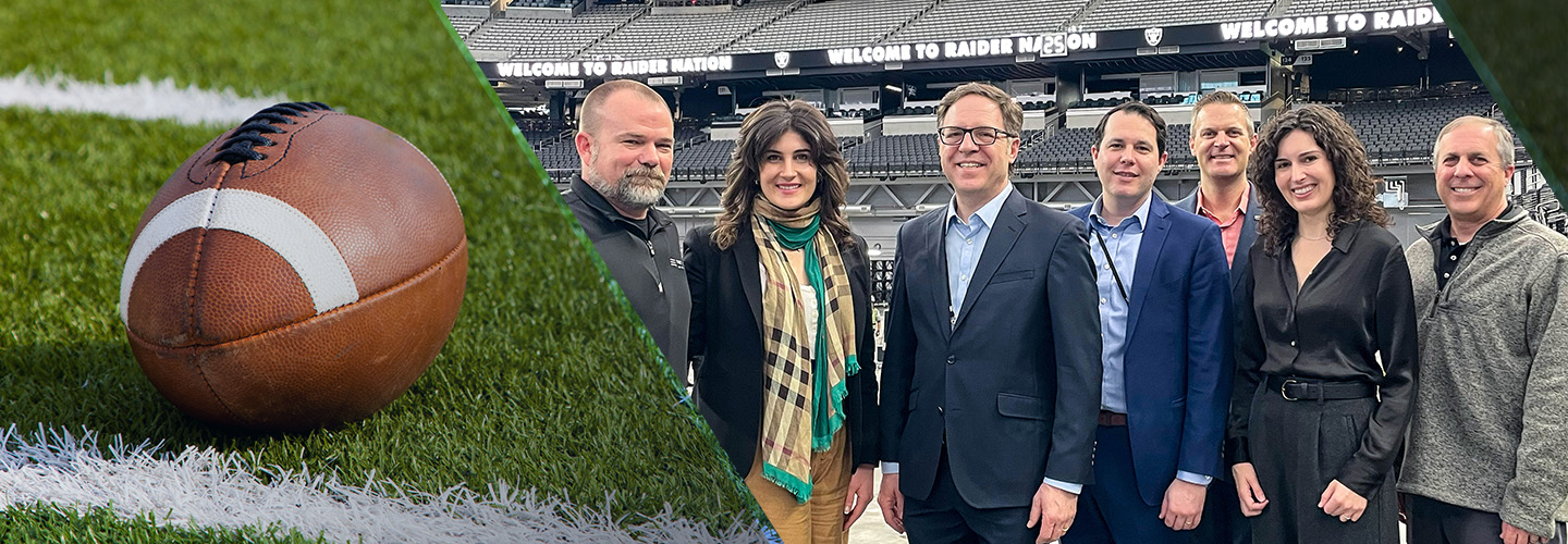 A football sits on a football field’s green turf; Assistant Secretary Alan Davidson, NTIA, and FirstNet Authority staff pose in Raiders’ Allegiant Stadium in Las Vegas