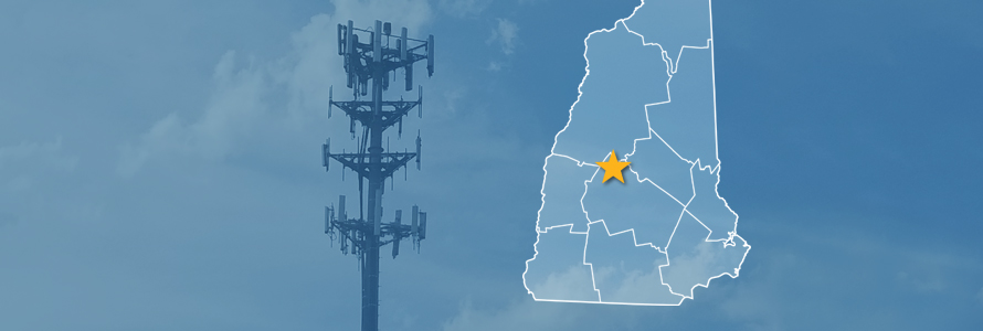 The State of New Hampshire, with outlined county borders and star locating Danbury, New Hampshire; a cell tower.