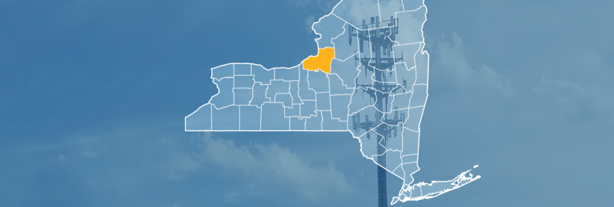 The state of New York, with outlined county borders; a cell tower.