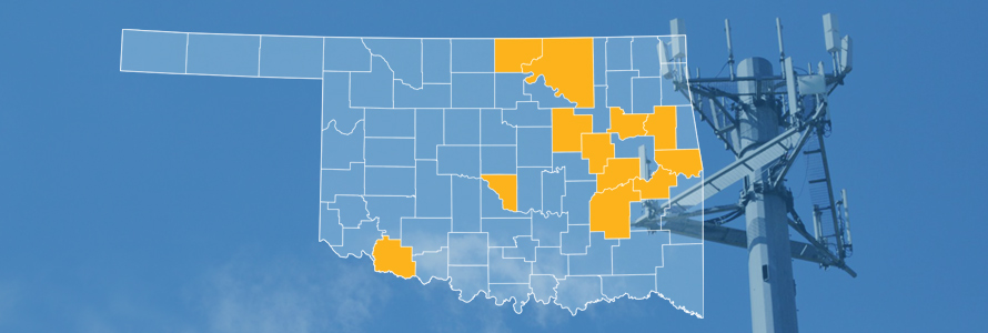 The state of Oklahoma, with outlined county borders; a cell tower