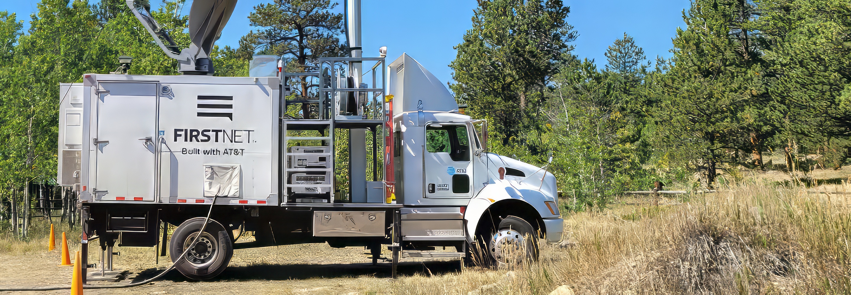 Deployed AT&T FirstNet SatCOLTin the wilderness. SatCOLTs, or satellite cell on light trucks, are mobile cell sites designed to establish a steady and consistent broadband connection.