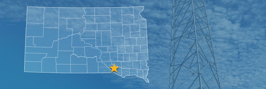 The state of South Dakota, with outlined county borders and a star locating Yankton Sioux Reservation, South Dakota; a cell tower.