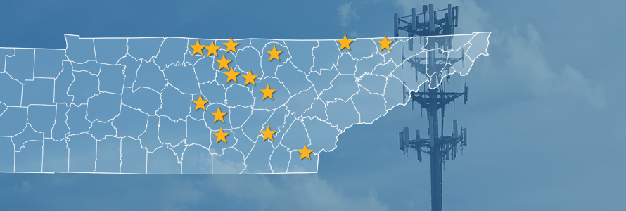 The state of Tennessee, with outlined county borders and 15 stars locating towns; a cell tower.