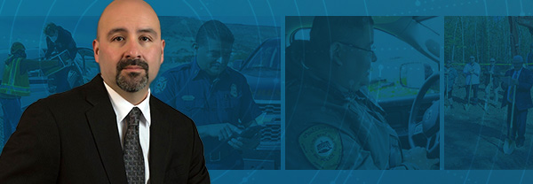 Headshot of the FirstNet Authority’s Tribal Government Liaison Jasper Bruner; two volunteers loading supplies onto an airplane; a responder using a FirstNet-enabled device to communicate in a rural area; a public safety officer in an emergency response vehicle; the FirstNet Authority’s board member Paul Patrick speaking at a cell site ground-breaking ceremony on tribal lands.