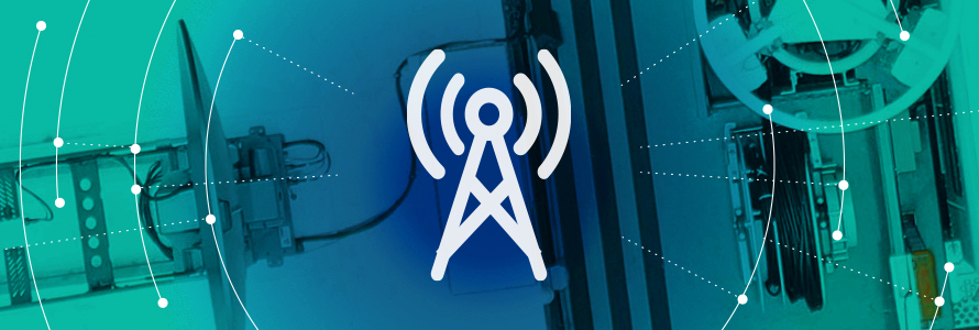 Roadmap Coverage and Capacity Domain icon (a broadband tower), surrounded by a graphic representation of a network radiating out, over an aerial view of a FirstNet SatCOLT 