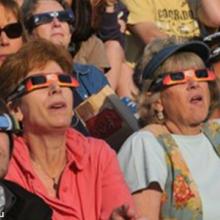 Visitors to Casper, Wyoming watch a solar eclipse