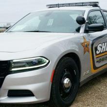 Police cruiser on a rural road