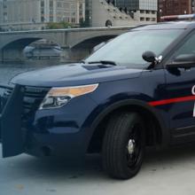Grand Rapids police vehicle and Grand Rapids skyline Grand Rapids police vehicle and Grand Rapids skyline