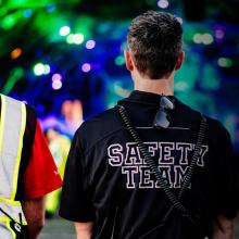 Members of the Prevent Medical Solutions team stand ready to respond at a music festival; “Prevent EMS” and “Safety Team” written on their shirts