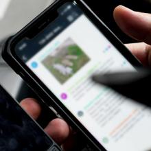 Two smartphones held by a responder Two smartphones held by a responder