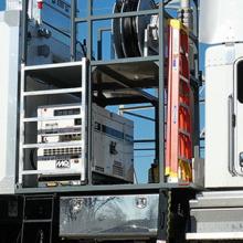 AT&T FirstNet Satellite Cell Light Truck and cell tower in background AT&T FirstNet Satellite Cell Light Truck and cell tower in background