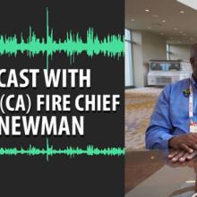 Chief Erik Newman of the Stockton Fire Department Chief Erik Newman and Dave Buchanan stand at a table together