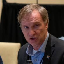 100 Days at the FirstNet Authority: governance, engagement, and a look ahead First Responder Network Authority Executive Director and CEO Joe Wassel speaking at a meeting attended by FirstNet Authority staff and public safety officials.