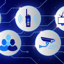 Virtual EOCs: A safe way to prepare for extreme weather incidents Representing a virtual emergency operations center (EOC), a FirstNet-equipped phone with lines connecting to icons representing various aspects of emergency response