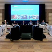 FirstNet Authority Board members sit at a table during a quarterly meeting