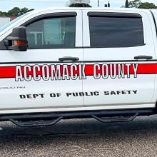 An Accomack County Department of Public Safety pickup truck with a compact rapid deployable (CRD) loaded on the hitch