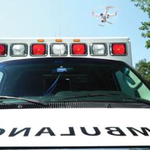Front view of an ambulance, including its lights. 