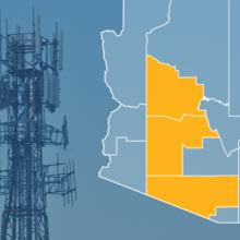 The state of Arizona, with outlined county borders; a cell tower.