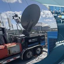 Safety is a team effort: Preparing for the World Cup in Dallas A FirstNet portable cell site on the left; on the right, public safety officials manage operations during the FIFA World Cup in the Dallas joint operations center.