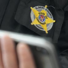 Elbert County Sheriff Norton holding a FirstNet-enabled phone Elbert County Sheriff Norton holding a FirstNet-enabled phone