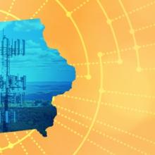 The silhouette of the State of Iowa revealing a cell tower inside; radiating connectivity illustration The silhouette of the State of Iowa revealing a cell tower inside; radiating connectivity illustration