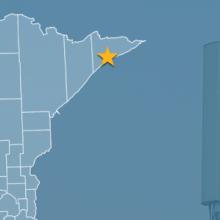 State of Minnesota with counties outlined; a star locating Gunflint Trail, a cell tower State of Minnesota with counties outlined; a star locating Gunflint Trail, a cell tower