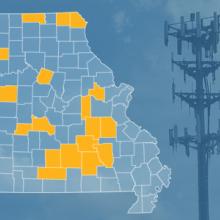 The state of Missouri, with outlined county borders; a cell tower.