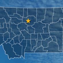 The state of Montana, with outlined county borders and a star locating cell site; a cell tower. The state of Montana, with outlined county borders and a star locating cell site; a cell tower.