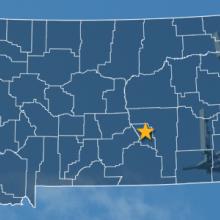 The state of Montana, with outlined county borders and a star locating cell site; a cell tower. The state of Montana, with outlined county borders and a star locating cell site; a cell tower.