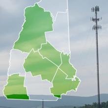 The state of New Hampshire, with outlined county borders; a cell tower. The state of New Hampshire, with outlined county borders; a cell tower.