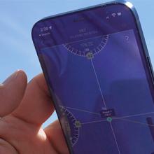 “Device-focused research enhances FirstNet user experience;" FirstNet Authority logo; a person using a smartphone “Device-focused research enhances FirstNet user experience;" FirstNet Authority logo; a person using a smartphone