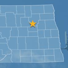 The state of North Dakota, with outlined county borders and a star locating Spirit Lake Reservation, North Dakota; a cell tower. The state of North Dakota, with outlined county borders and a star locating Spirit Lake Reservation, North Dakota; a cell tower.