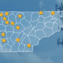 The state of Tennessee, with outlined county borders and 15 stars locating towns; a cell tower.