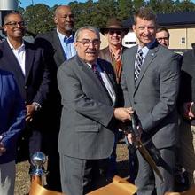 FirstNet Authority staff, Congressman G.K. Butterfield (NC-1), and local leaders cut a ribbon near new FirstNet site in Wayne County North Carolina