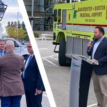 Governor Chris Sununu, public safety officials, and AT&T representatives in front of a FirstNet SatCOLT at Manchester-Boston Regional Airport; FirstNet Authority Senior Public Safety Advisor Bruce Fitzgerald speaking at a press event in front of a Manchester-Boston Regional Airport fire vehicle.