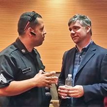 A member of the FirstNet Authority’s Public Safety Advocacy team speaks with an officer at one of the 500 engagements from across the nation. 