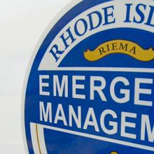 The Rhode Island Emergency Management Agency logo on a truck.