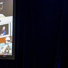 FirstNet Authority Board Chair Edward Horowitz stands behind a podium with a large screen featuring the FirstNet logo and images of first responders to his right. FirstNet Authority Board Chair Edward Horowitz stands behind a podium with a large screen featuring the FirstNet logo and images of first responders to his right.