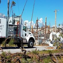An AT&T SatCOLT is set up among damage from Hurricane Michael